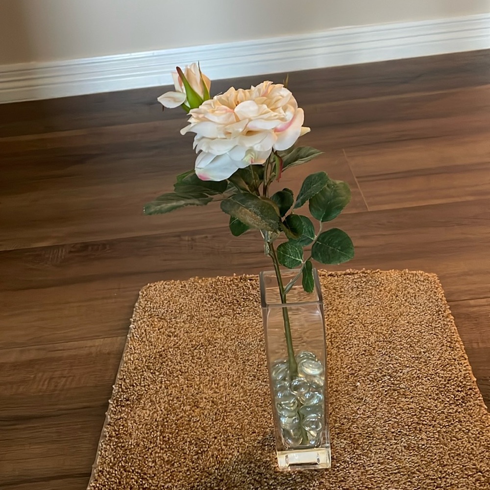 Beautiful realistic looking blooming rose with bud
